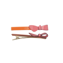 Load image into Gallery viewer, Two Tone Orange and Pink Bow Clips
