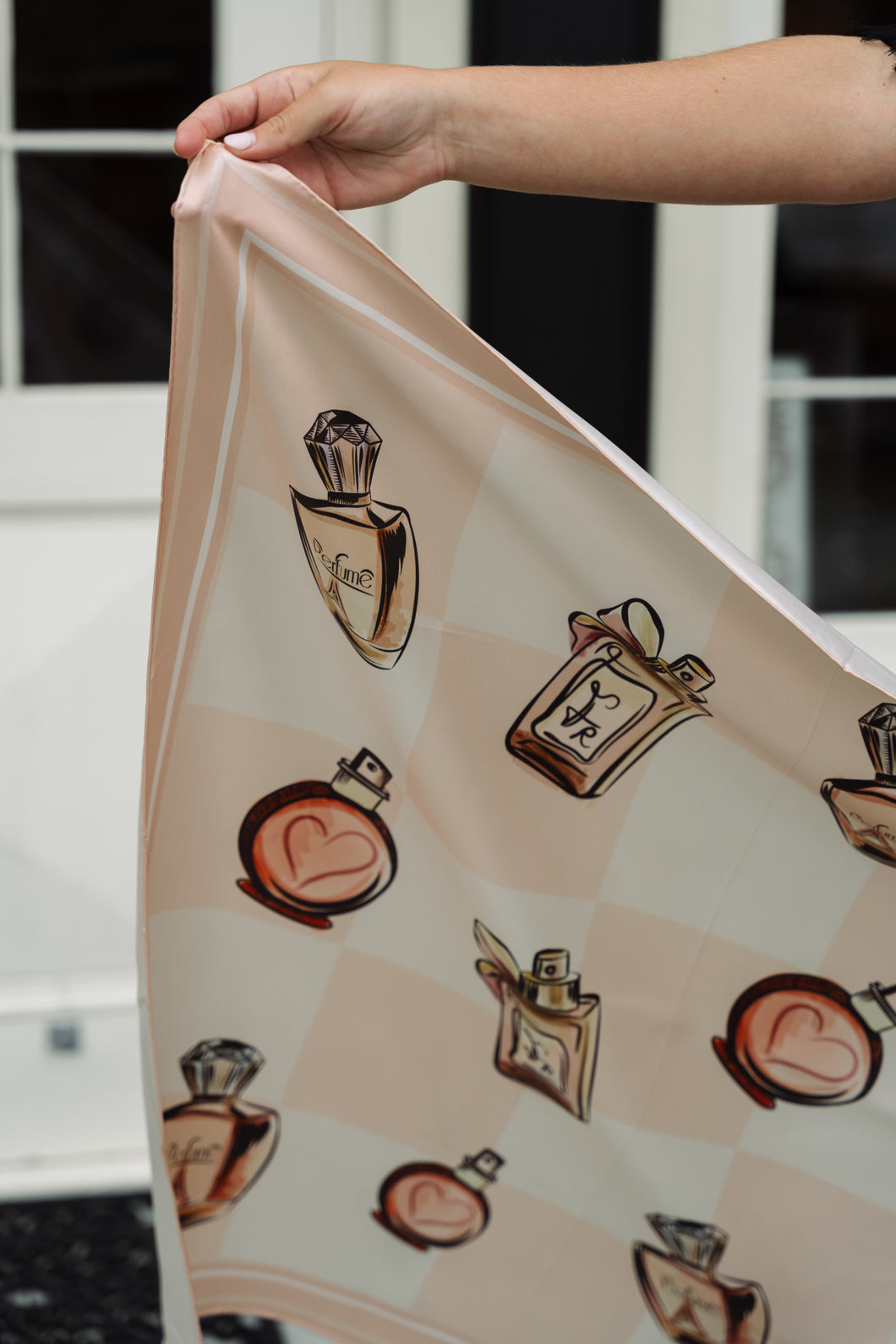 A perfume collection in Peach and White